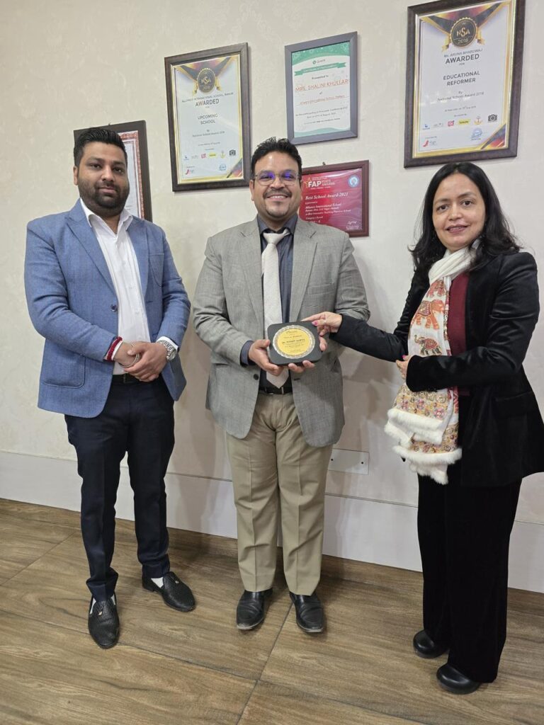 Dr. Mohit Gupta honoured by Alliance International School after a dental camp